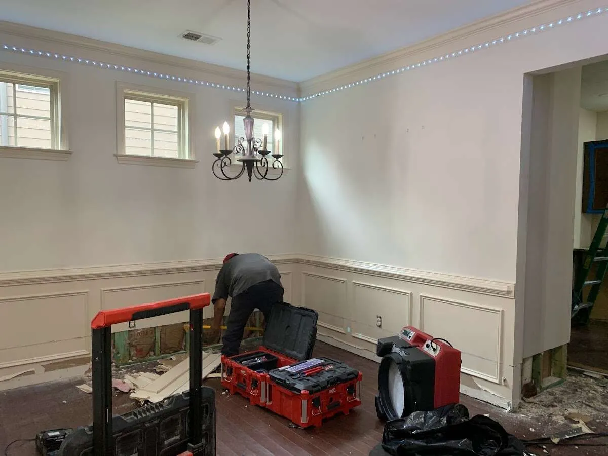 Restoration technician with professional equipment in Dunellen